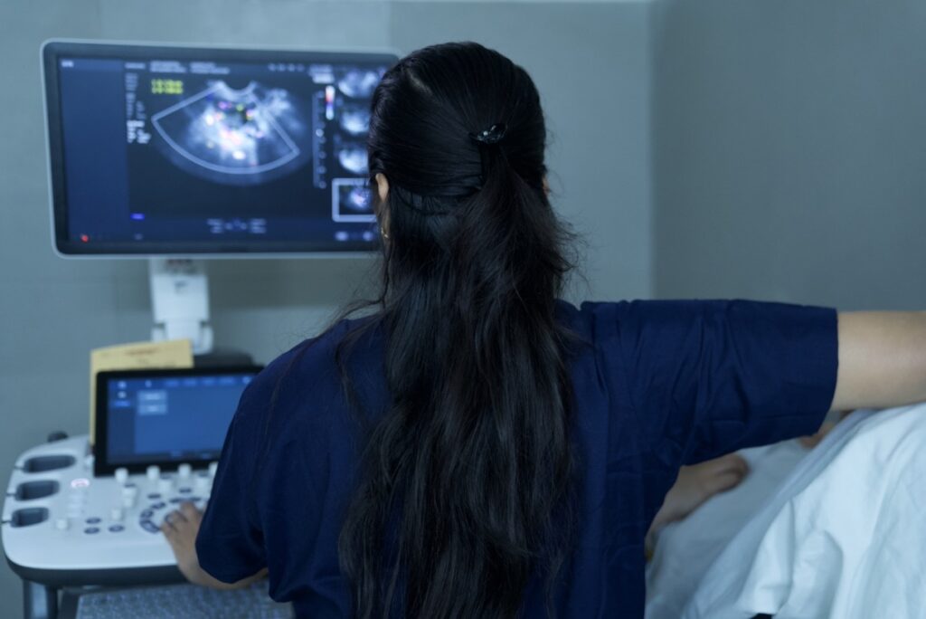 Gynaecologist at CRAAFt IVF centre using the ultrasound doppler for female evaluation